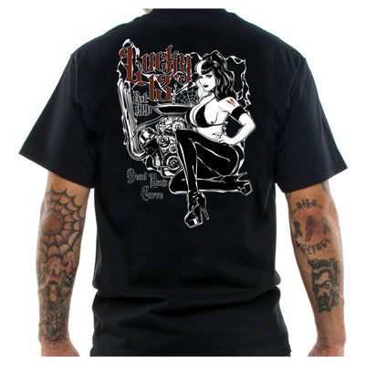 image of mens black t-shirt with lady leaning on motor in a bikini top and boots